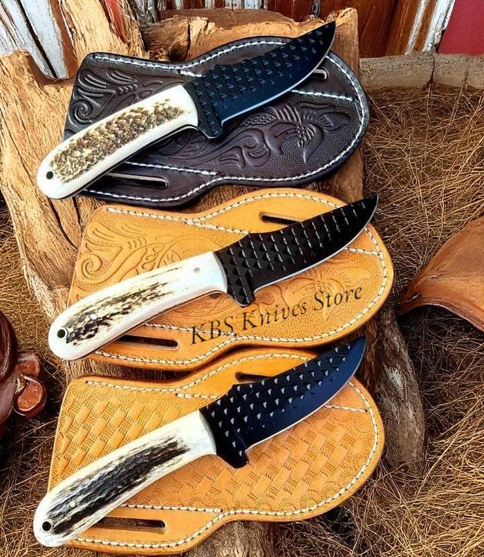 Custom handmade ranch cowboy knife with black powder-coated blade and antler horn handles
